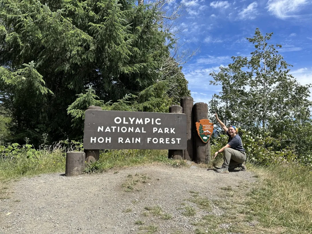 Kyla Richards poses with the Olympic National Park sign