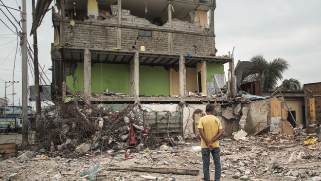 A man observes the aftermath of the earthquake that struck Pedernales, Ecuador.